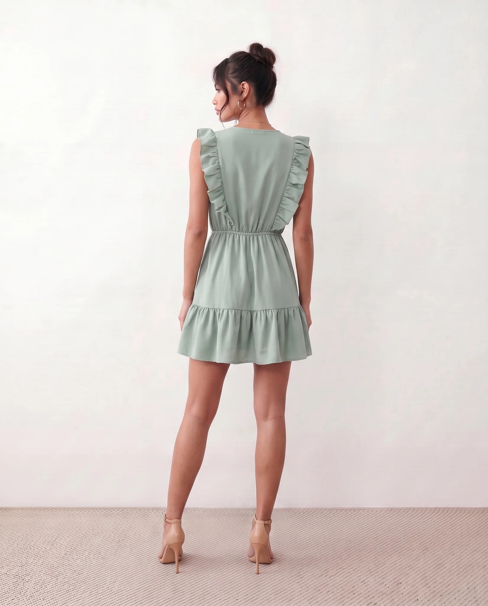 Marita Ruffle Detail Mini Dress in Green — back view