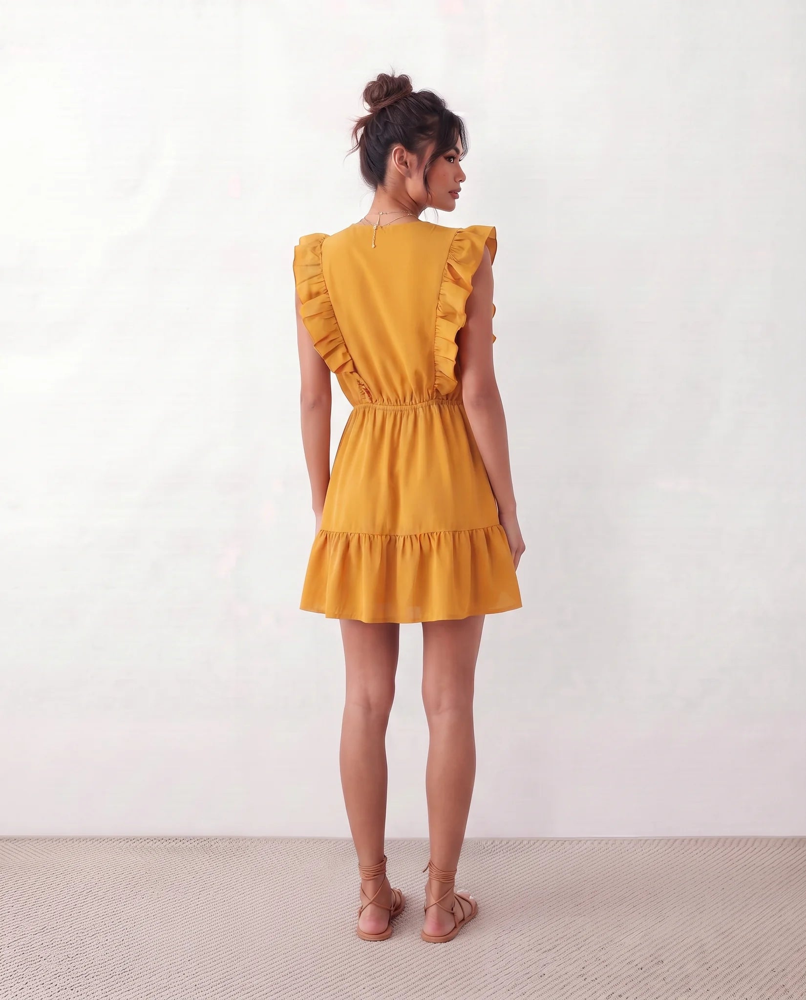 Marita Ruffle Detail Mini Dress in Yellow — back view