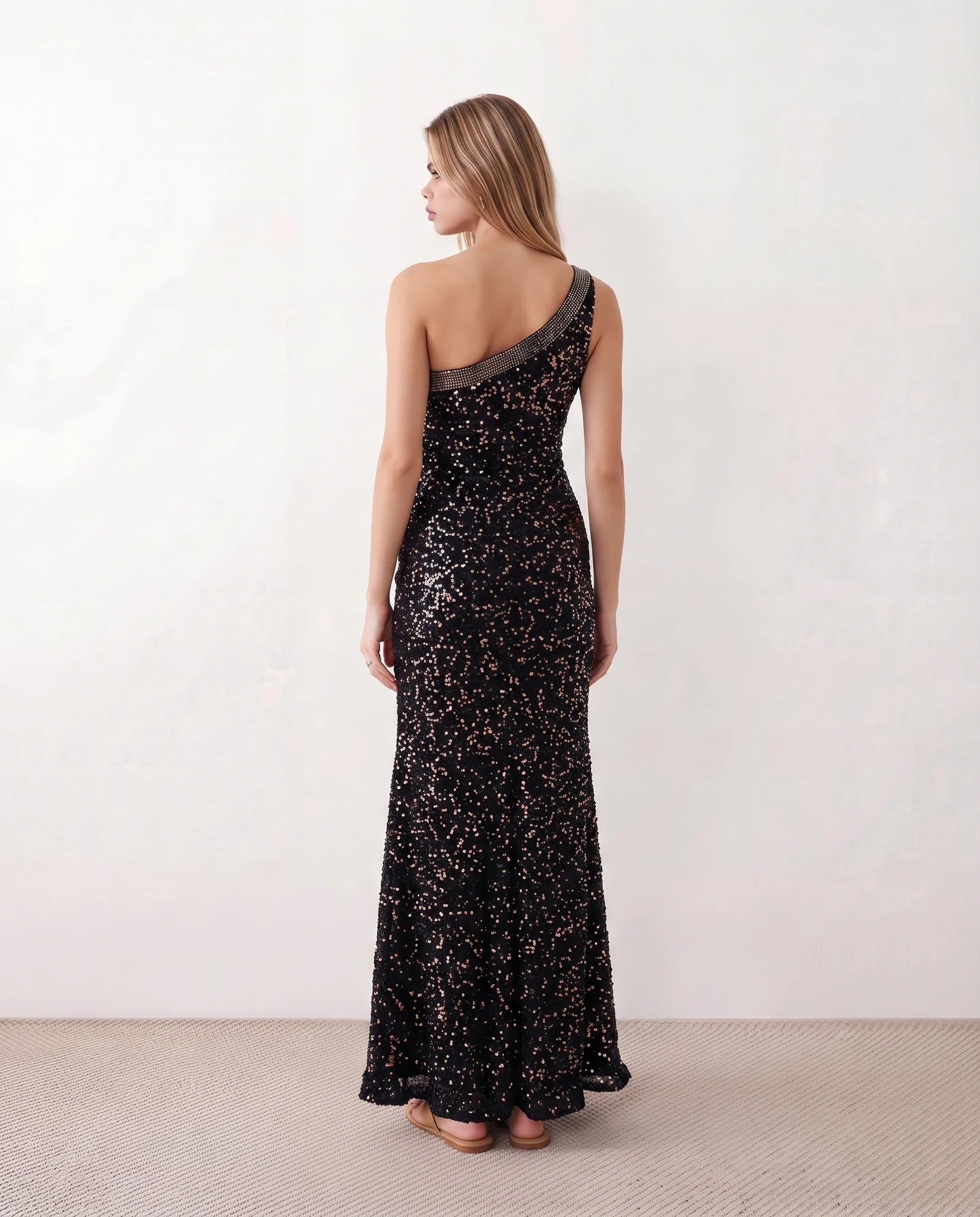 Christa Sequined Asymmetric Neck Maxi Dress in Black — back view