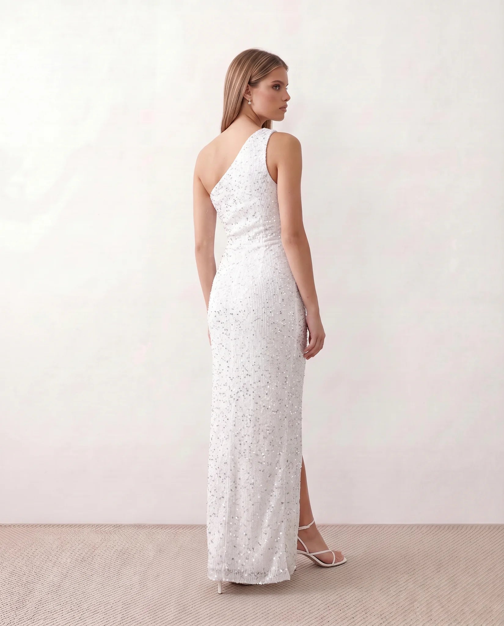 Christa Sequined Asymmetric Neck Maxi Dress in White — back view