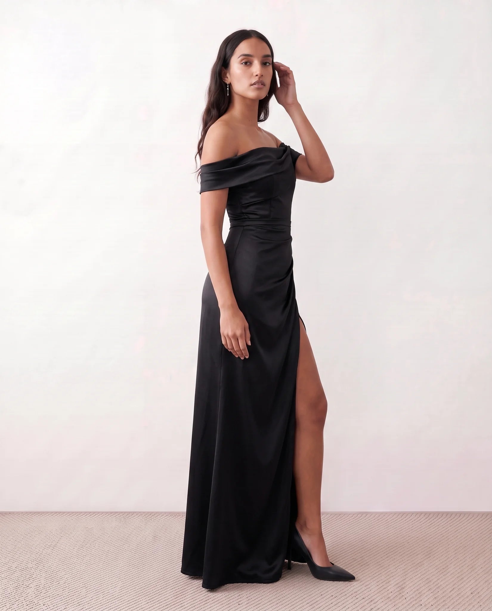 Adela Glossy Off Shoulder Maxi Dress in Black — side view