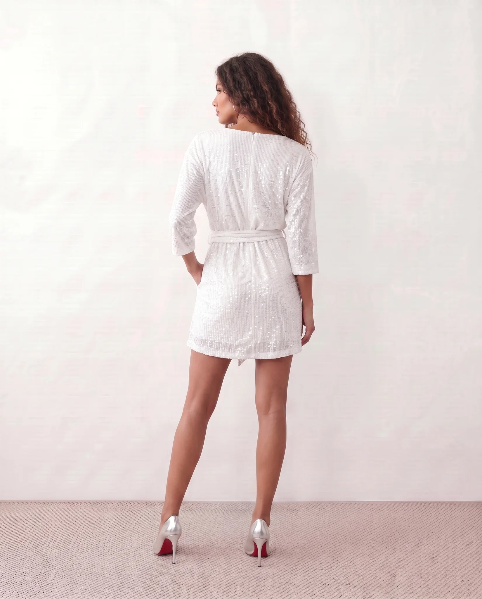 Yaritza Sequined Belted Mini Dress in White — back view