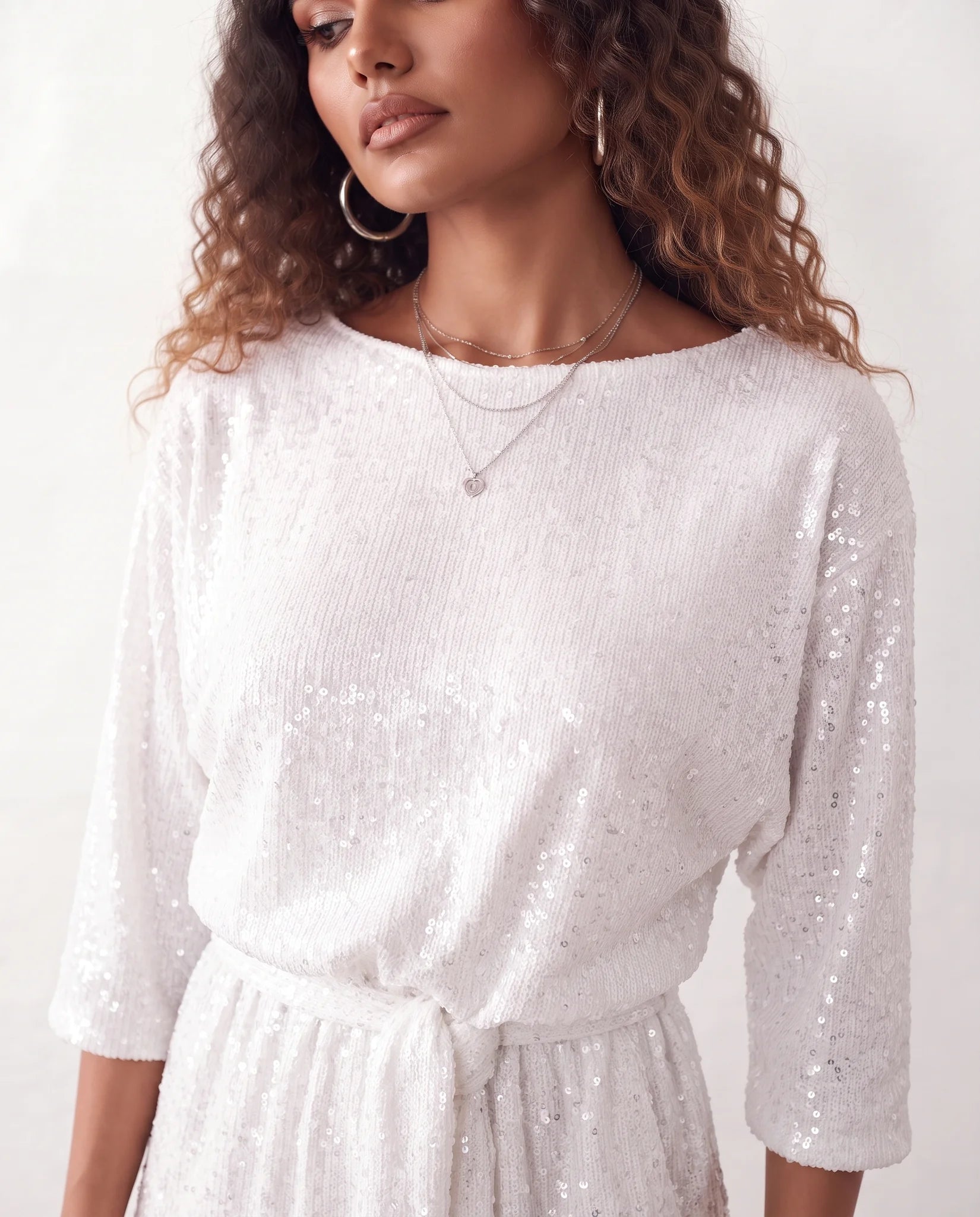 Yaritza Sequined Belted Mini Dress in White — detail close-up