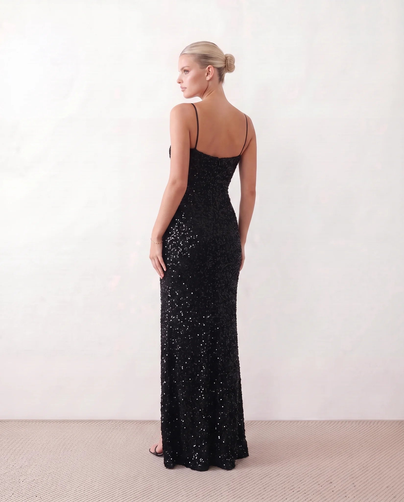 Ninoska Sequined Spaghetti Strap Maxi Dress in Black — back view