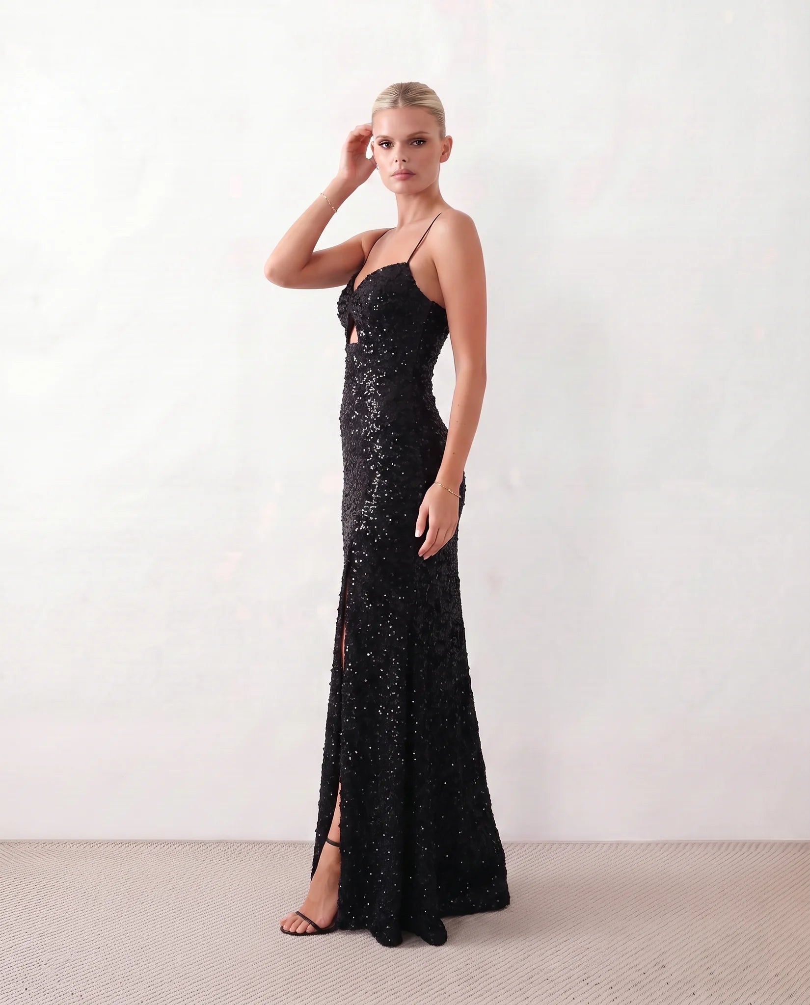 Ninoska Sequined Spaghetti Strap Maxi Dress in Black — side view