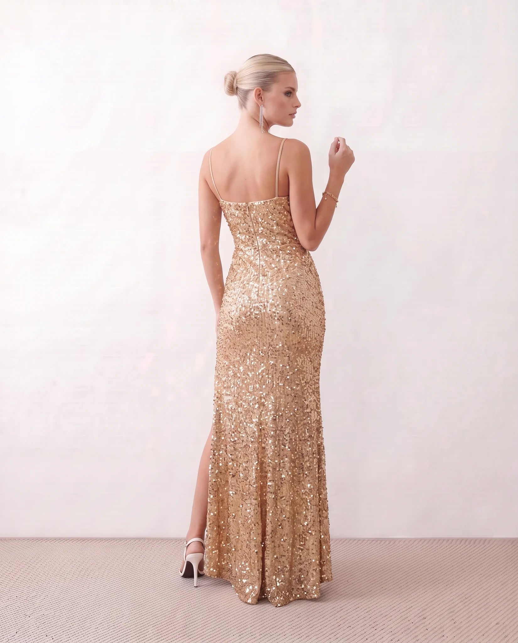 Ninoska Sequined Spaghetti Strap Maxi Dress in Gold — back view