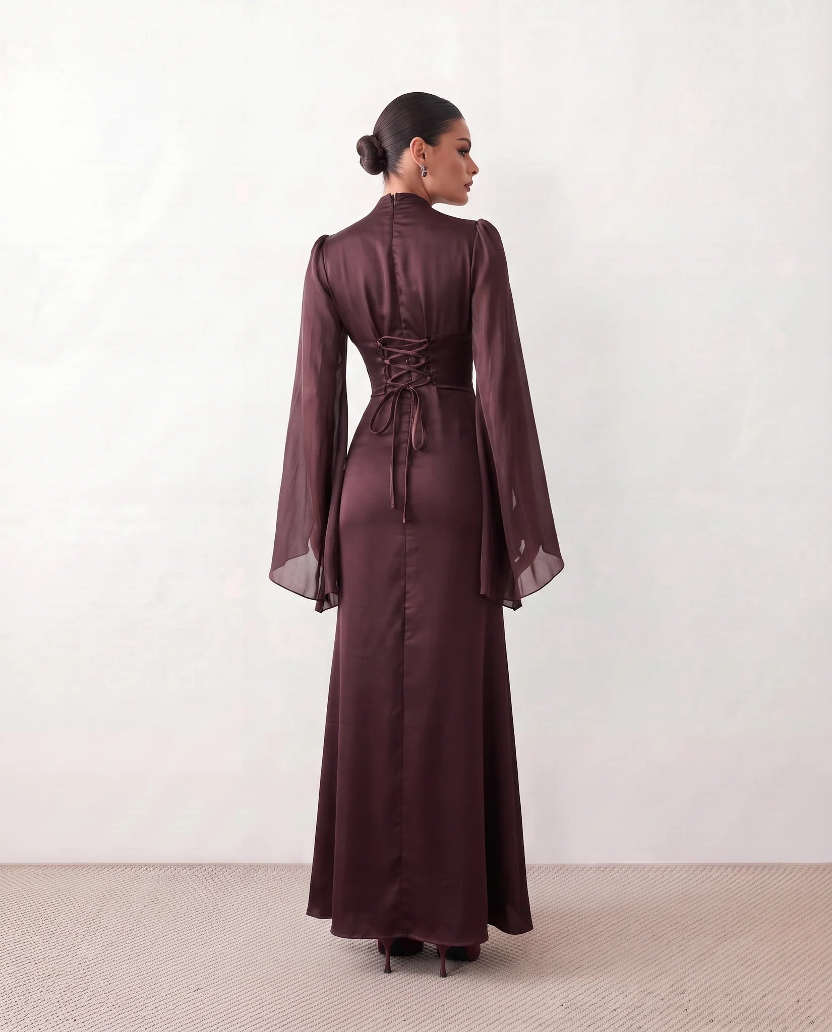Siofra Glossy Lace-Up Maxi Dress in Brown — back view